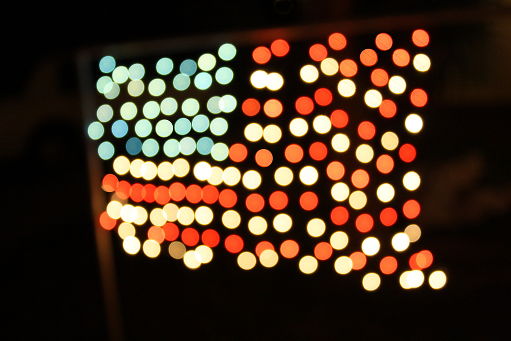 Christmas lights arranged as an American flag (Mubina H/Flickr)